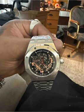 Audemars Piguet Silver Bracelet Skeleton Dial Watch with Rose-Gold Accents